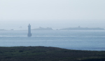 Pointe du Stiff (Beg Stif), 2011. Du haut du phare: lande de Penarland, Kéréon, Ile de Bannec; phare des Pierres Noires dans la brume à l`horizon. Voir aussi `Images de Ouessant - phare de Keréon`.